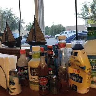 a variety of condiments on a table