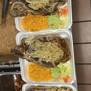 a row of plates of food