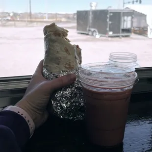Bacon Breakfast Burrito and a Little ChaiMaid from Deja Brew beside them @ Flat Acres Farm