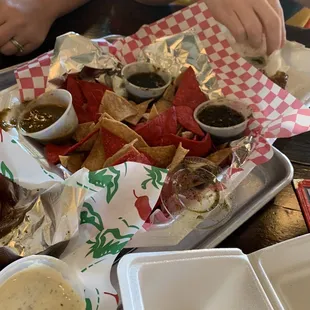 Chips and salsa...one of these sauces is very spicy!