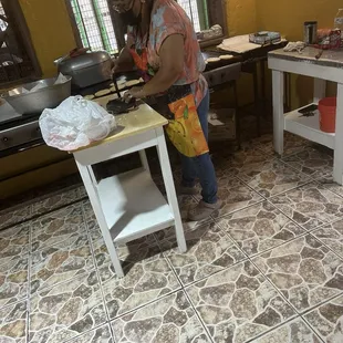 Pressing tortillas fresh!