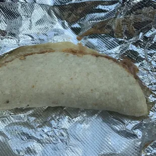 a taco wrapped in foil