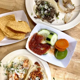 Variety of street tacos (shrimp, chicken, steak, chorizo) and chips &amp; salsa and fresh veggies