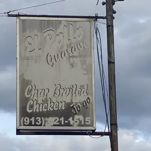 a sign on a telephone pole