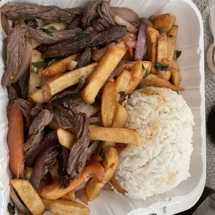 a meal in a styrofoam container