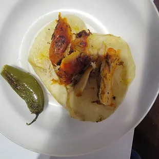 Chicken grilled since morning I suspect....this is def not flour tortilla