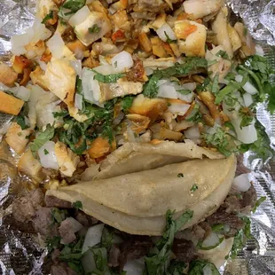 Two chicken and a carne asada tacos