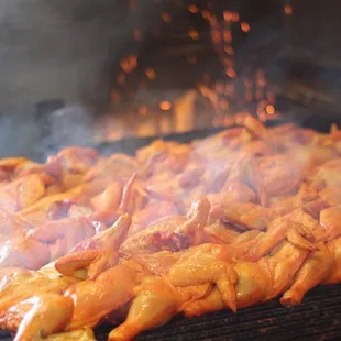 a grill full of chicken