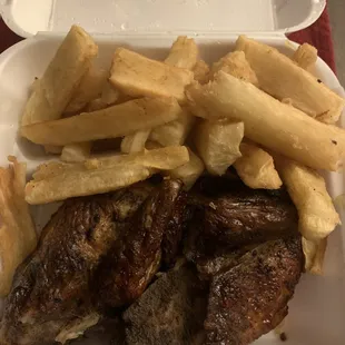 1/2 rotisserie chicken with 2 side orders (yucca here and black beans)