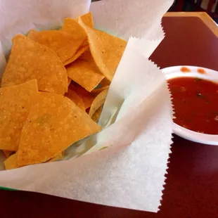 Free chips.  Standard chips.  Runny thin salsa.