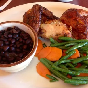 1/2 chicken.  Dry and bland.  Black beans and string beans were good.