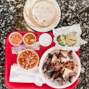 Whole grilled chicken with a side of rice