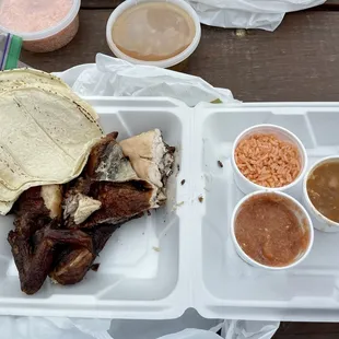 Half bbq chicken with rice and beans