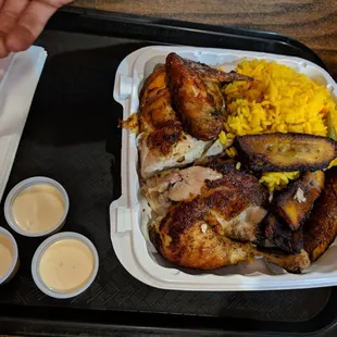 1/2 chicken, rice, and plantains for 10$  Yummmmm