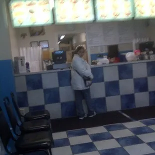 The 10 year old son working behind the counter...!