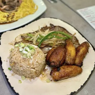 Carne Asada - Grilled skirt steak served with choice of two sides