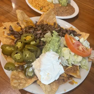 Nachos and side rice and beans.  Best nachos I&apos;ve had ever!!
