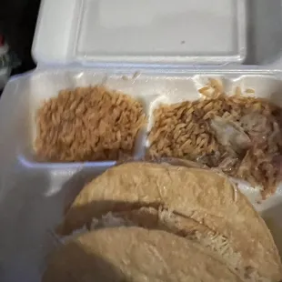 This is after I had to get it re-fixed to chicken tacos only cheese beans, and rice. Not very hot.