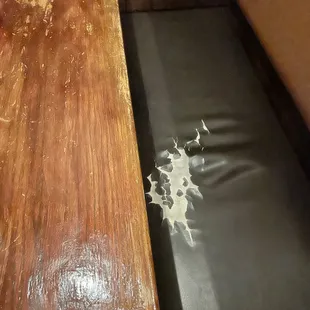 Upholstery needs replacing and table tops need refinishing in booths