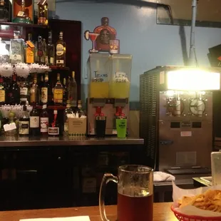 The bar at El Porton. 2 flavors of margarita, if you believe the Sharpie captions.