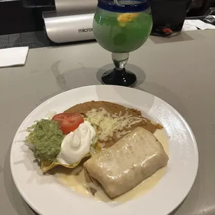 a plate of food and a drink