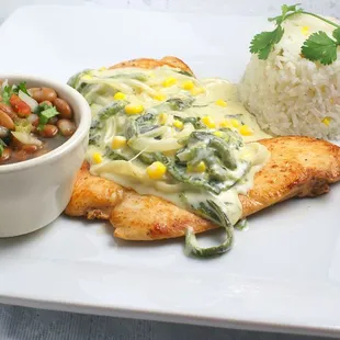 a plate of food with rice and beans