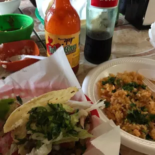 Gorditas, rice, bottled Mexican coke.  Always fresh salsa and chips comes w every order.