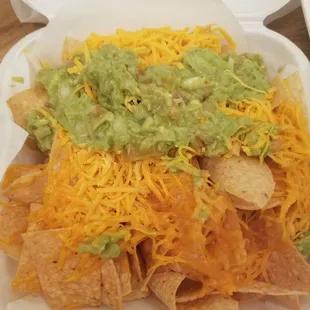 Chips with guac... love all the cheese!