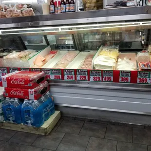 a deli case filled with food