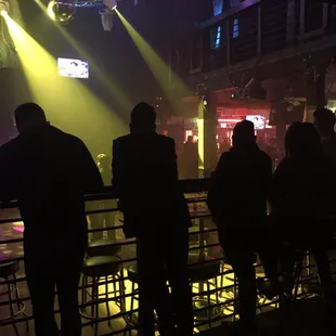 people sitting at a bar