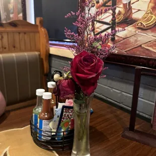 The cute little flower they have on each table.