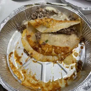 I kid you not this is what it looked like when I opened it. Supposed to be a tostada and enchilada.
