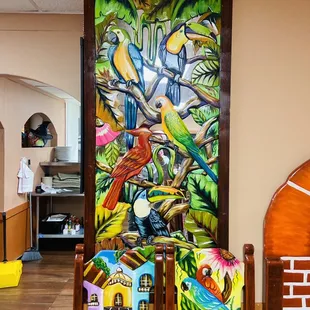 a painting of a tropical scene