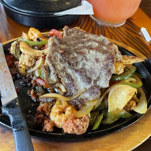 Speciality fajitas-steak, chicken, chorizo and shrimp all in one!