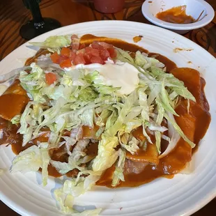 Cinco enchiladas-shredded beef, chicken, beef, cheese and bean