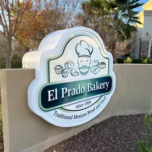Outside sign and palm trees