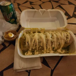 Asada wet burrito with green salsa