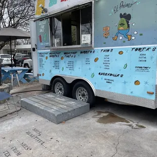 a food truck parked in a parking lot