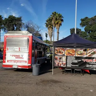 a red and white food truck