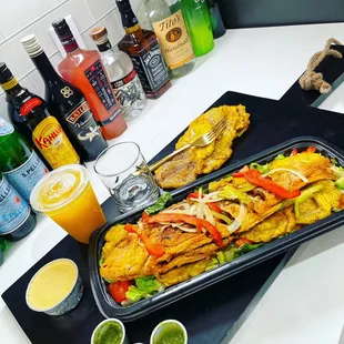 a large platter of mexican food
