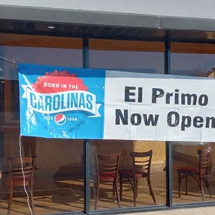 a sign in the window of a restaurant