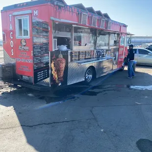 a food truck parked in a parking lot