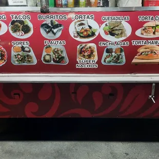 a food truck with a menu on it