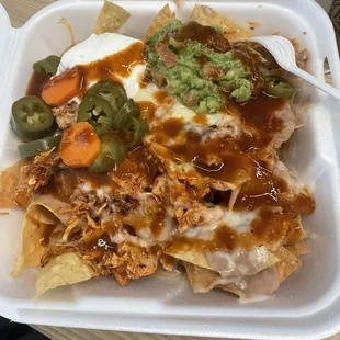 Chicken nachos. I added the red sauce.