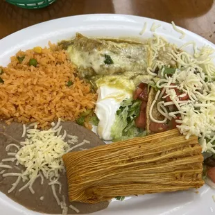 Combination with steak taco, chicken enchilada, and pork tamale