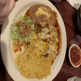 a plate of mexican food on a table