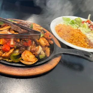 Mixed fajitas with rice and beans