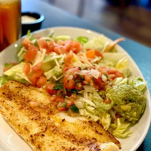 Asked for grilled instead of breaded and fried.... delicious! Extra salad, no rice and beans