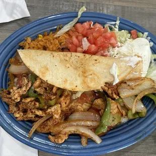 Lunch fajita quesadilla, the filling is pulled out because my mom was eating it like a salad.