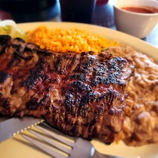 a plate of food with a fork and knife